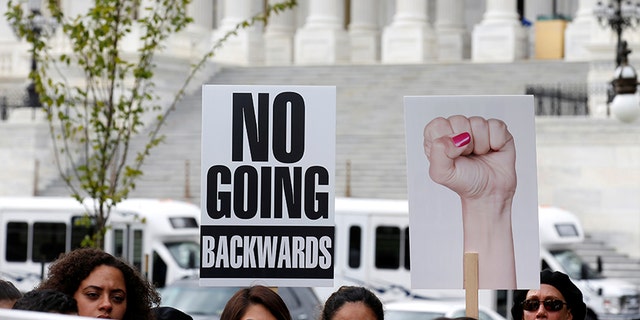 Immigration activists and DACA recipients take part in a rally about the importance of passing a clean DREAM Act before delivering a million signatures to Congress on Capitol Hill in Washington, U.S., September 12, 2017. REUTERS/Joshua Roberts - RC12FE56AD50