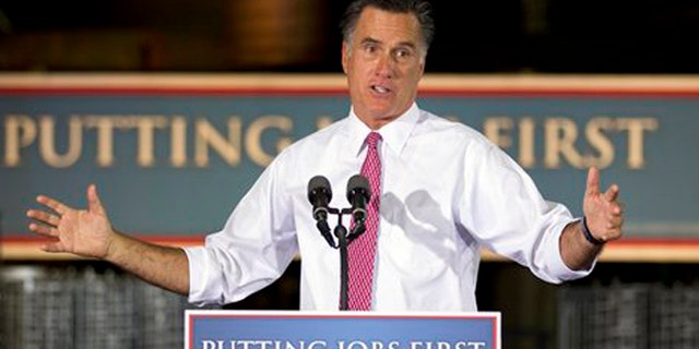 June 14, 2012: GOP presidential candidate Mitt Romney gestures during a campaign stop at Seilkop Industries in Cincinnati, Ohio.