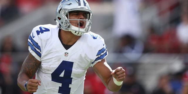 SANTA CLARA, CA - OCTOBER 02: Dak Prescott #4 of the Dallas Cowboys celebrates after a rushing touchdown by running back Ezekiel Elliott (not pictured) against the San Francisco 49ers at Levi's Stadium on October 2, 2016 in Santa Clara, California. (Photo by Ezra Shaw/Getty Images)