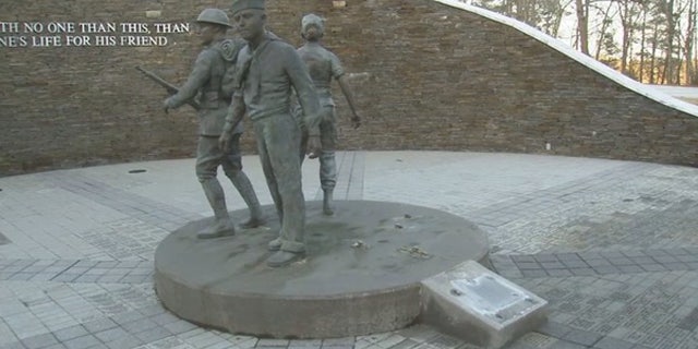 The damaged Walk of Heroes War Veterans Memorial in Conyers, Ga.
