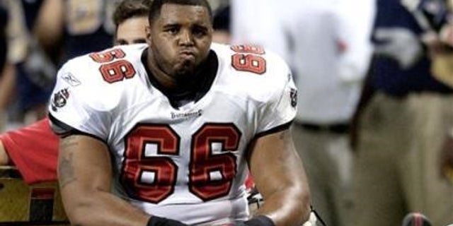 Damian Gregory carted off the field after an injury in 2004.