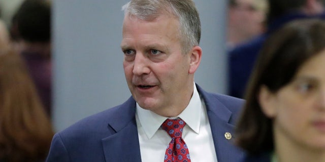 Sen. Dan Sullivan, R-Alaska, leaves the Capitol after Republicans released their long-awaited bill to scuttle much of President Barack Obama's Affordable Care Act, in Washington, Thursday, June 22, 2017. GOP leaders hope to vote on the bill next week and can only afford two defections from the 52 Senate Republicans but the measure encountered immediate trouble as four Republican senators said they opposed it but were open to negotiations. (AP Photo/J. Scott Applewhite)