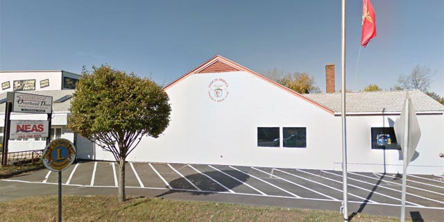 The man reportedly fell from the roof of the Danbury social club and onto a rotisserie stand.