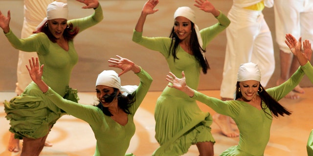File photo - Venezuelan dancers perform during the draw to decide the match schedule for the Copa America Venezuela 2007 soccer tournament, in Caracas Feb. 14, 2007. (REUTERS/Francesco Spotorno)