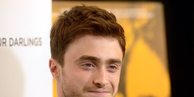 Cast member Daniel Radcliffe attends the film premiere of "Kill Your Darlings" in Beverly Hills, California October 3, 2013.