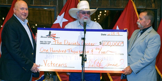 Pictured left to right: Major General Terry “Max” Haston, Charlie Daniels, David Corlew at the inaugural "Veteran Impact Celebration."