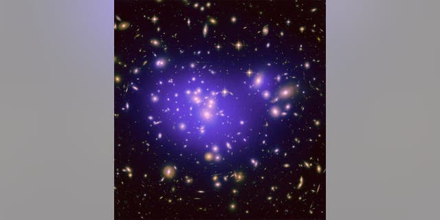 The galaxy cluster Abell 1689 is famous for the way it bends light in a phenomenon called gravitational lensing. A new study of the cluster is revealing secrets about how dark energy shapes the universe. <a href="http://www.space.com/scienceastr</p">NASA, ESA, E. Jullo (JPL/LAM), P. Natarajan (Yale) and J-P. Kneib (LAM)
</a>