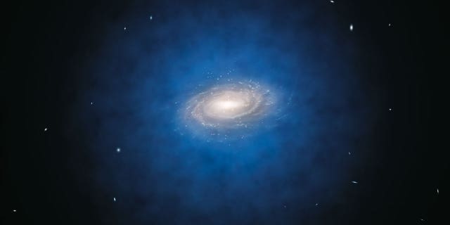 April 18, 2012: The most accurate study so far of the motions of stars in the Milky Way has found no evidence for dark matter in a large volume around the Sun. The blue halo of material surrounding the Milky Way in this artist's impression indicates the previously expected distribution of the mysterious dark matter.