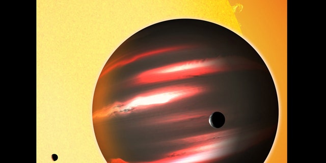 The distant exoplanet TrES-2b, shown here in an artist's conception, is darker than the blackest coal. This Jupiter-sized world reflects less than one percent of the light that falls on it, making it blacker than any planet or moon in our solar system.