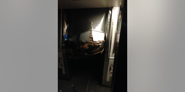 The collapsed roof inside the first train car.