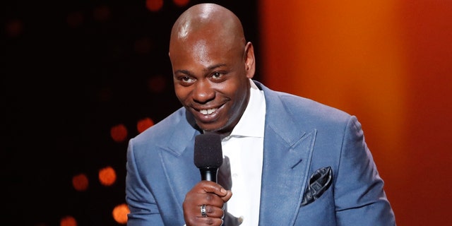 Dave Chappelle says he feels sorry for poor white Trump voters in new stand-up special on Netflix. Here, Chappelle presents an award at the 2017 Canadian Screen Awards in Toronto.