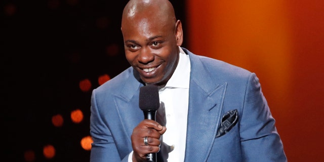 Dave Chappelle says he feels sorry for poor white Trump voters in new stand-up special on Netflix. Here, Chappelle presents an award at the 2017 Canadian Screen Awards in Toronto.