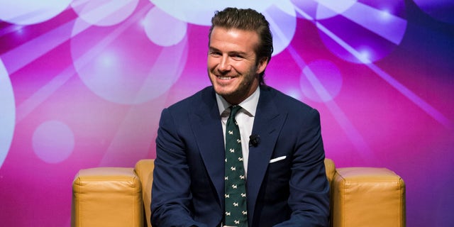 November 22, 2013. Former England soccer team captain David Beckham attends a promotional event at the Venetian Macao hotel in Macau.