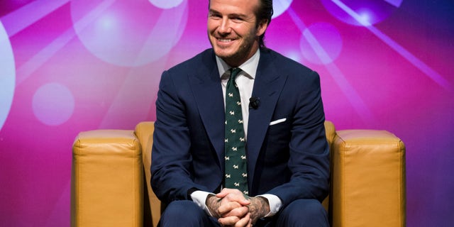 November 22, 2013. Former England soccer team captain David Beckham attends a promotional event at the Venetian Macao hotel in Macau.