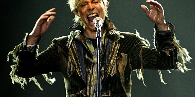 June 23, 2004. British singer David Bowie performs in a concert during his worldwide tour called "A Reality Tour" at T-mobile arena in Prague.