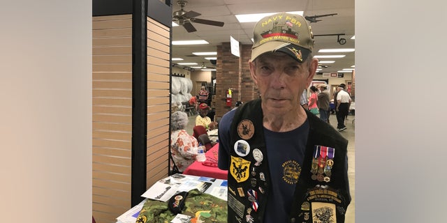 Vietnam veteran David Larsen was one of several former service members on hand to speak to members of the public about wartime experiences during the Trail of Honor event in Jackson, Miss.