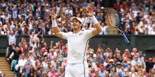 LONDON, ENGLAND - JULY 10: Andy Murray of Great Britain celebrates victory during the Men's Singles Final against Milos Raonic of Canada on day thirteen of the Wimbledon Lawn Tennis Championships at the All England Lawn Tennis and Croquet Club on July 10, 2016 in London, England. (Photo by Julian Finney/Getty Images)