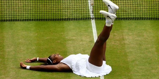 LONDON, ENGLAND - JULY 09: Serena Williams of The United States celebrates victory following The Ladies Singles Final against Angelique Kerber of Germany on day twelve of the Wimbledon Lawn Tennis Championships at the All England Lawn Tennis and Croquet Club on July 9, 2016 in London, England. (Photo by Julian Finney/Getty Images)