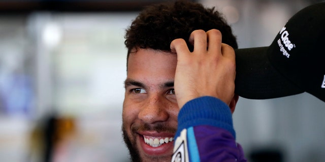 Darrell Wallace Jr. relaxes in his garage during practice for the NASCAR Daytona 500 auto race at Daytona International Speedway, Saturday, Feb. 17, 2018, in Daytona Beach, Fla.