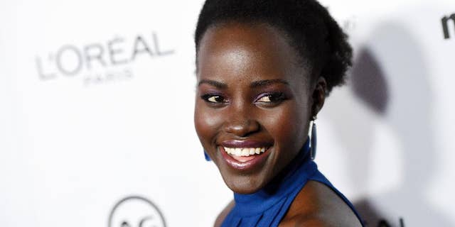 FILE - In this Jan. 12, 2016 file photo, actress Lupita Nyong'o poses at the Marie Claire Image Maker Awards in Los Angeles. Following a second straight year of all-white acting Oscar nominees, Nyong’o said Tuesday, Jan. 19, on Instagram she was joining in “calling for change in expanding the stories that are told and recognition of the people who tell them.” (Photo by Chris Pizzello/Invision/AP, FIle)
