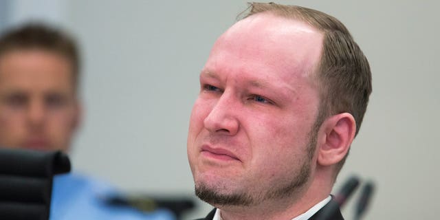 April 16, 2012: Norwegian Anders Behring Breivik, who is facing terrorism and premeditated murder charges, reacts as a video presented by the prosecution is shown in court, Oslo, Norway.