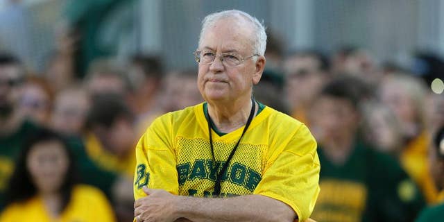 Baylor President Ken Starr waits to run onto the field before a college football game in Waco, Texas, on Sept. 12, 2015.