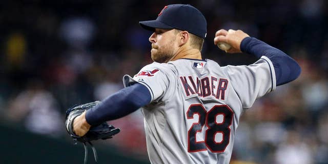 Cleveland Indians' Corey Kluber throws a pitch to the Arizona Diamondbacks during the first inning of a baseball game Wednesday, June 25, 2014, in Phoenix. (AP Photo/Ross D. Franklin)