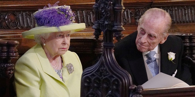 Queen Elizabeth II and Prince Phillip at St. George's Chapel at Windsor Castle for the wedding of Meghan Markle and Prince Harry.