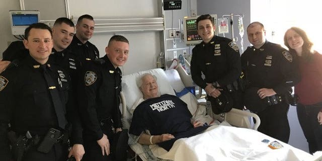 New York City police officers saved an 83-year-old tourist when went into cardiac arrest in Times Square.