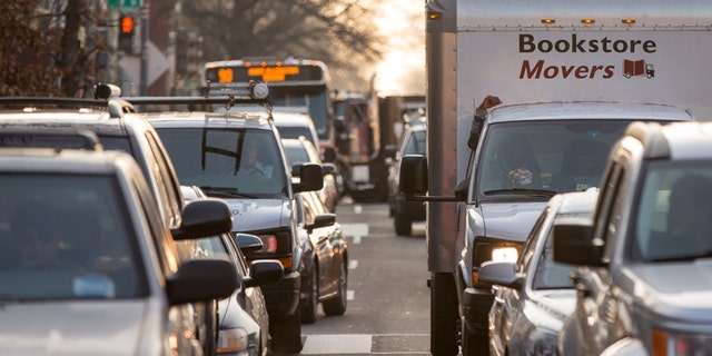 Cars sit in traffic along Florida Avenue in the Shaw neighborhood, in Washington, Wednesday, March 16, 2016.