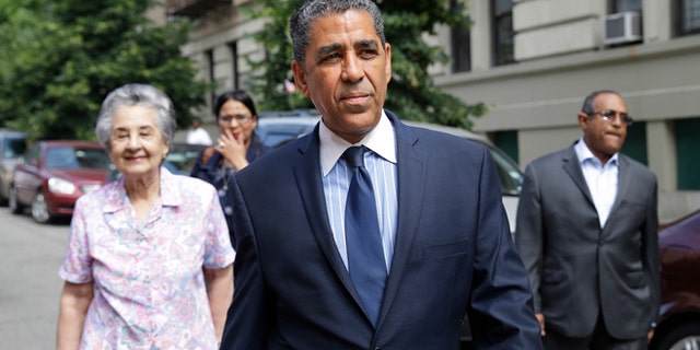 In this June 24, 2014 file photo, Senator Adriano Espaillat arrives to his polling station in New York. Espaillat, who arrived to the U.S. a poor immigrant from the Dominican Republican without authorization, won the Democratic primary for his New York district in late June 2016 for the House of Representatives. (AP Photo/Seth Wenig, File)