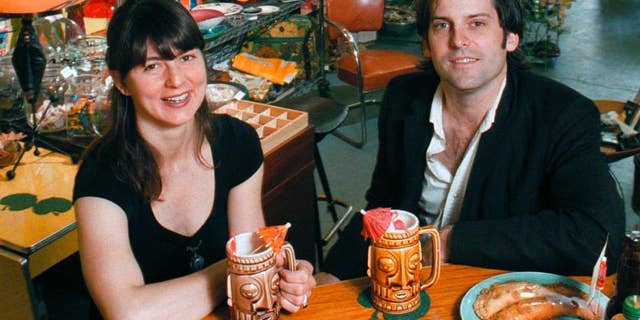 FILE- In this May 17, 1996 file photo Kathryn and Bryan Harvey pose in their store in Richmond, Va. More than 11 years after the brutal murders of the well-known Richmond couple and their children, some hope the execution of the man convicted of the killings will close a painful chapter of the community’s history. Ricky Gray is scheduled to be put to death Jan. 18, 2017, for the murders. (Alexa Welch Edlund/Richmond Times-Dispatch via AP, File)