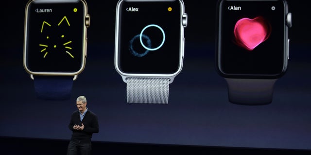 Apple CEO Tim Cook talks about the new Apple Watch during an Apple event on Monday, March 9, 2015, in San Francisco. (AP Photo/Eric Risberg)