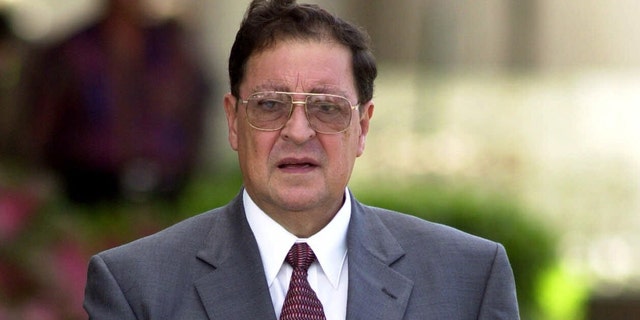 Former defense minister of El Salvador, Carlos Eugenio Vides Casanova, leaves federal court in Palm Beach, Fla.