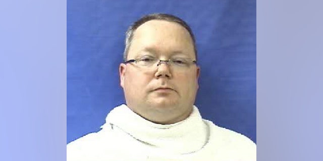 This photo provided by the Kaufman County Sheriff's Office shows Eric Williams. Williams was admitted to the Kaufman County Jail, in Kaufman, Texas, early Saturday, April 13, 2013, and charged with making a "terroristic threat." Federal and local authorities searched Williams' home Friday as part of an investigation into the deaths of District Attorney Mike McLelland and his wife, Cynthia. (AP Photo/Kaufman County Sheriff's Office)