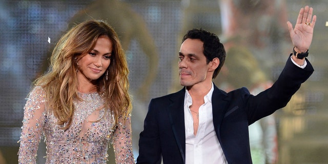 LAS VEGAS, NV - MAY 26:  Singer/actress Jennifer Lopez (L) and singer Marc Anthony appear during the finale of the Q'Viva! The Chosen Live show at the Mandalay Bay Events Center on May 26, 2012 in Las Vegas, Nevada.  (Photo by Ethan Miller/Getty Images)