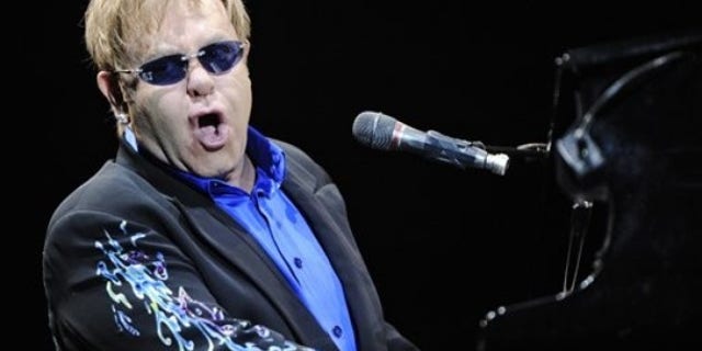 British pop singer and composer Elton John performs in Kosice, Slovakia, Tuesday, June 22, 2010. (AP Photo/CTK, Peter Lazar) **SLOVAKIA OUT**