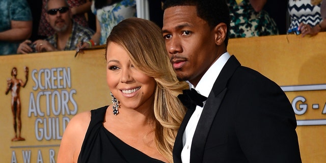 Singer Mariah Carey and her soon to be ex husband Nick Cannon, on January 18, 2014.