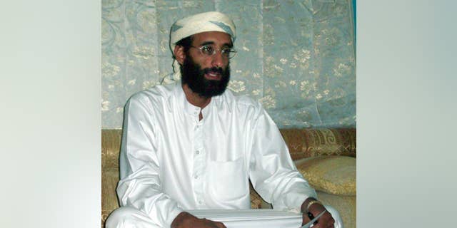 FILE - This October 2008, file photo shows Imam Anwar al-Awlaki in Yemen. Investigators say the blast that rocked New York's Chelsea neighborhood on Sept. 17, 2016, that injured more than two dozen people, was the latest in a long line of incidents in which the attacker was inspired by al-Awlaki, the American imam-turned al-Qaida propagandist who was killed by a U.S. drone strike five years ago. (AP Photo/Muhammad ud-Deen, File)