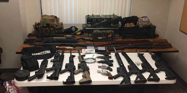 A search of Johnston's house yielded a cache of weapons and explosive devices, federal prosecutors said.