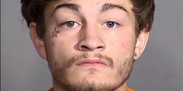 This image provided by the Indianapolis Metropolitan Police Department shows Johnathan Cruz. Prosecutor Terry Curry said Wednesday, June 1, 2016, that 19-year-old Cruz faces multiple charges including robbery, intimidation and a criminal gang enhancement. (Indianapolis Metropolitan Police Department via AP)