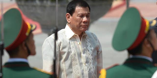 FILE - In this Thursday, Sept. 29, 2016 file photo, Philippine President Rodrigo Duterte reviews an honor guard during a welcome ceremony at the Presidential Palace in Hanoi during his two-day visit to Vietnam. Israel's Foreign Ministry says it's "unfortunate" that Duterte chose to invoke Adolf Hitler and the Holocaust in his bloody anti-crime war. Spokesman Emmanuel Nahshon says Saturday, Oct. 1, Israel is convinced the Philippine president "will find a way to clarify his words." (Hoang Dinh Nam/Pool Photo via AP, File)