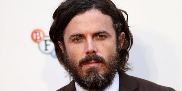 Actor Casey Affleck poses for photographers at a Gala screening of his film "Manchester by the Sea" at the 60th BFI London Film Festival in London, Britain October 8, 2016. REUTERS/Neil Hall - RTSRDOZ