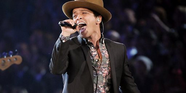 FILE - In this Nov. 7, 2012 file photo, Bruno Mars performs during the 2012 Victoria's Secret Fashion Show in New York. Mars will perform at this year's Super Bowl. (Photo by Evan Agostini/Invision/AP)