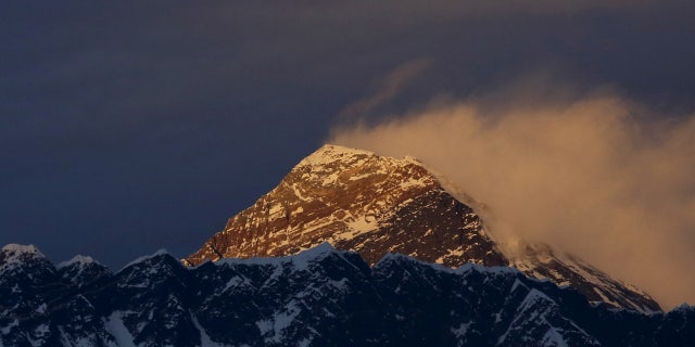 FILE: Two climbers were found dead on Mount Everest, both above 24,000 feet.