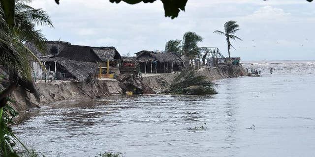 Damaged houses and restaurants are seen by the beach in Acapulco, Mexico, on September 19, 2013.