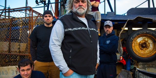 Captain Wild Bill Wichrowski (center) and his crew.