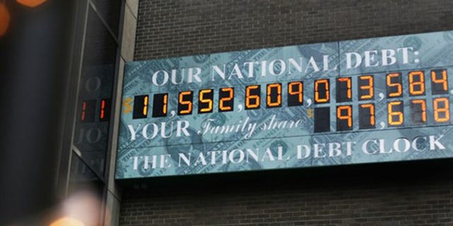The National Debt Clock, which shows the U.S. national debt, is seen in New York City Aug. 24. That number has since surpassed $12 trillion. (Reuters Photo)
