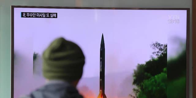 A man watches a TV news program showing a file image of missile launch conducted by North Korea, at the Seoul Railway Station in Seoul, South Korea, Thursday, Oct. 20, 2016. The U.S. military says it detected a "failed" North Korean missile launch on Wednesday.  The U.S. Strategic Command issued a statement late Wednesday saying it presumed the missile was a Musudan intermediate-range ballistic missile.(AP Photo/Lee Jin-man)