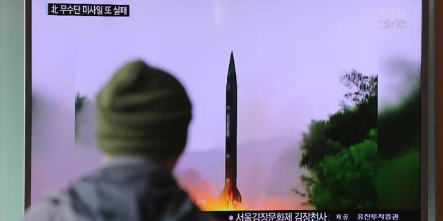 A man watches a TV news program showing a file image of missile launch conducted by North Korea, at the Seoul Railway Station in Seoul, South Korea, Thursday, Oct. 20, 2016. The U.S. military says it detected a "failed" North Korean missile launch on Wednesday. The U.S. Strategic Command issued a statement late Wednesday saying it presumed the missile was a Musudan intermediate-range ballistic missile.(AP Photo/Lee Jin-man)